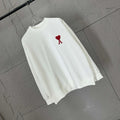 White crewneck sweatshirt with red heart emblem and small red A logo