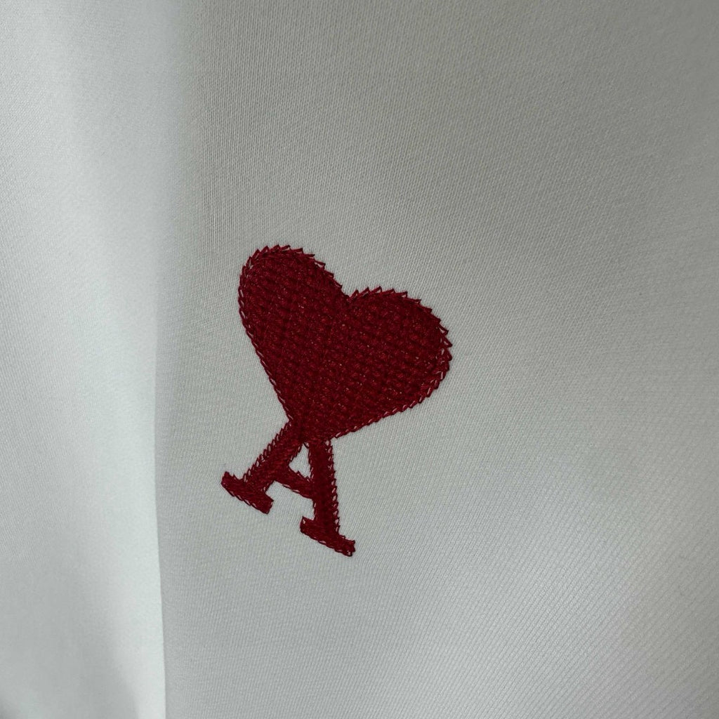 Red heart and A graphic patch on white sweatshirt