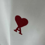 Red heart and A graphic patch on white sweatshirt