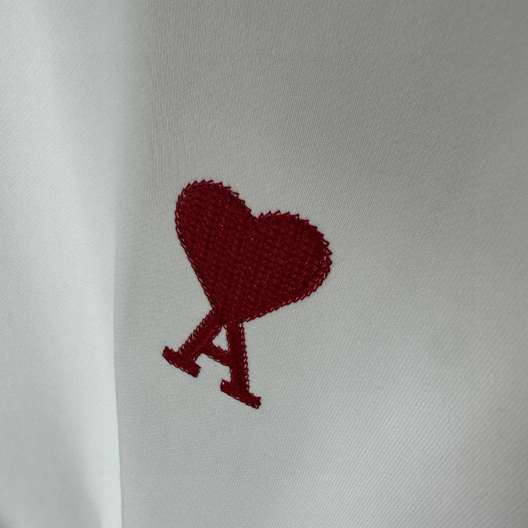 Red heart and A graphic patch on white sweatshirt