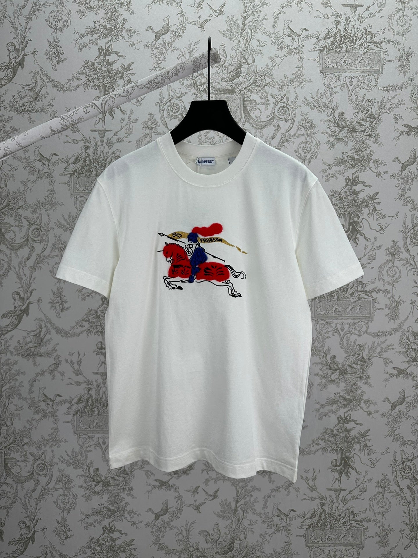 Burberry short-sleeve T-shirt in white with colorful horse rider graphic on front