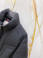Moncler long puffer jacket with hood lining and side zipper seam detail