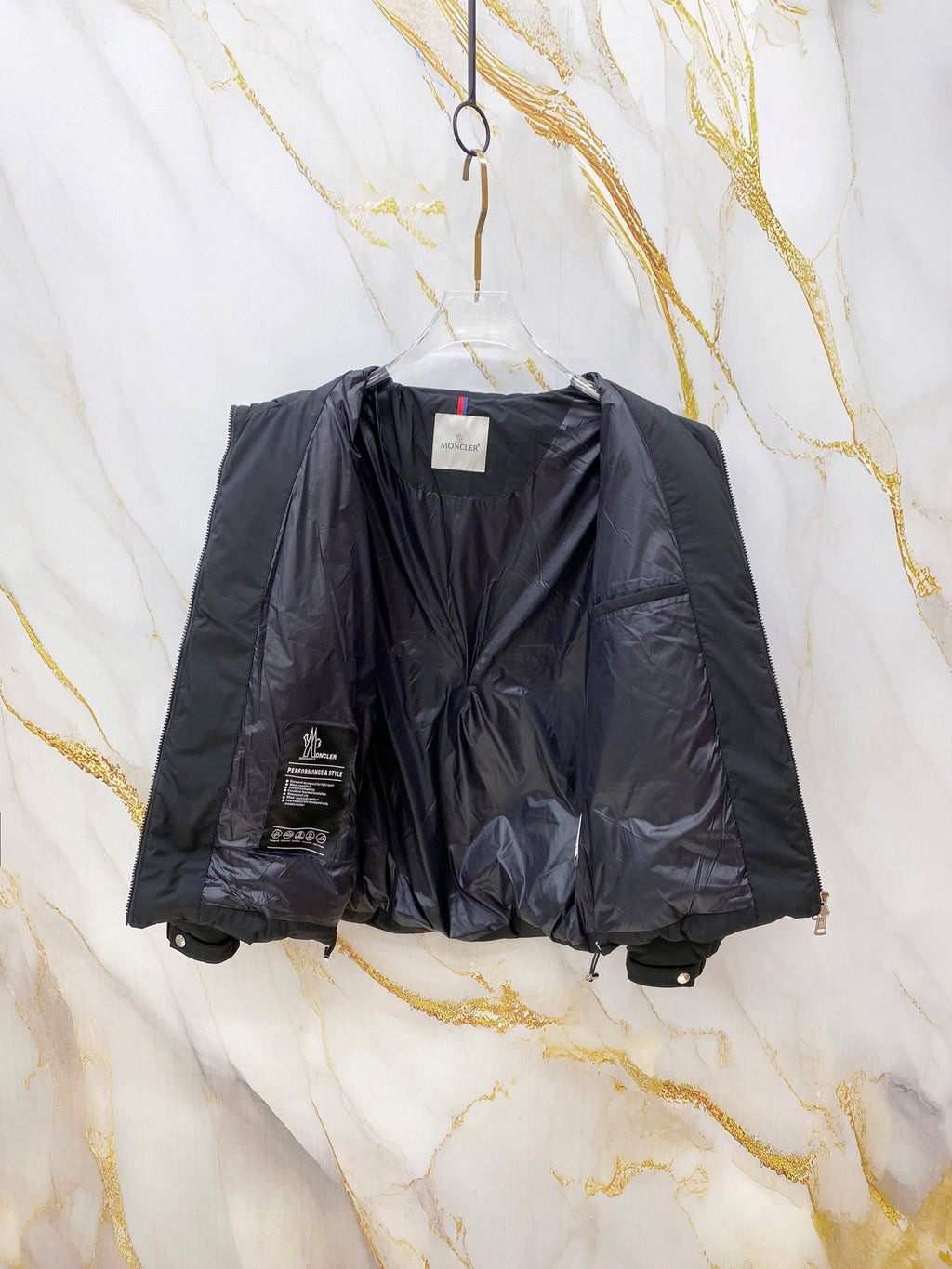 Moncler long puffer jacket with inner lining and zip front, hanging open