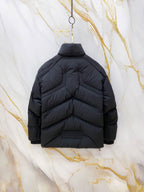 Moncler long puffer jacket back view with hood and dark quilted stitching