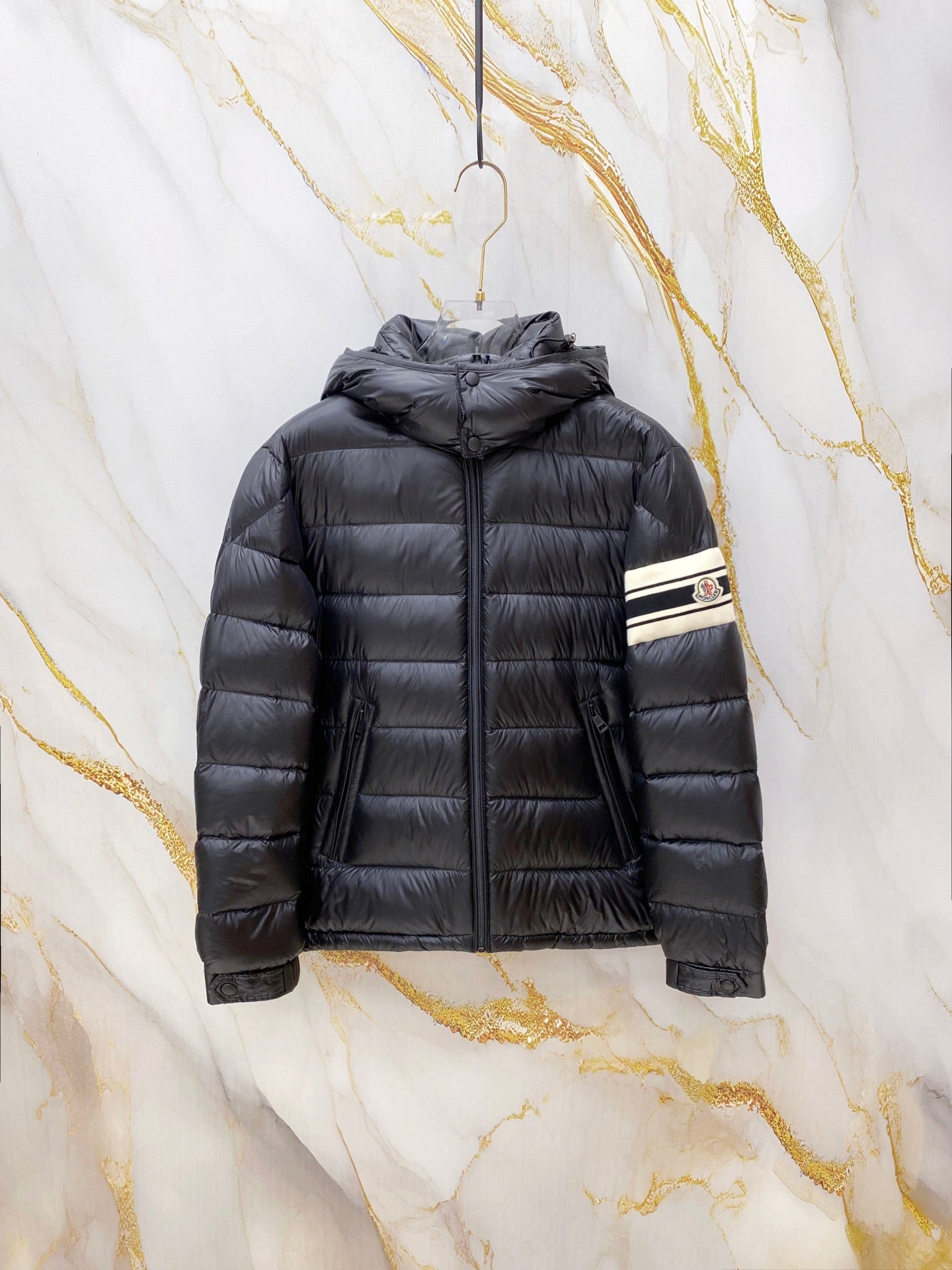 Moncler long hooded puffer jacket in dark gray with full front zipper