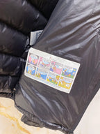 Moncler long puffer jacket with logo patch and zip front