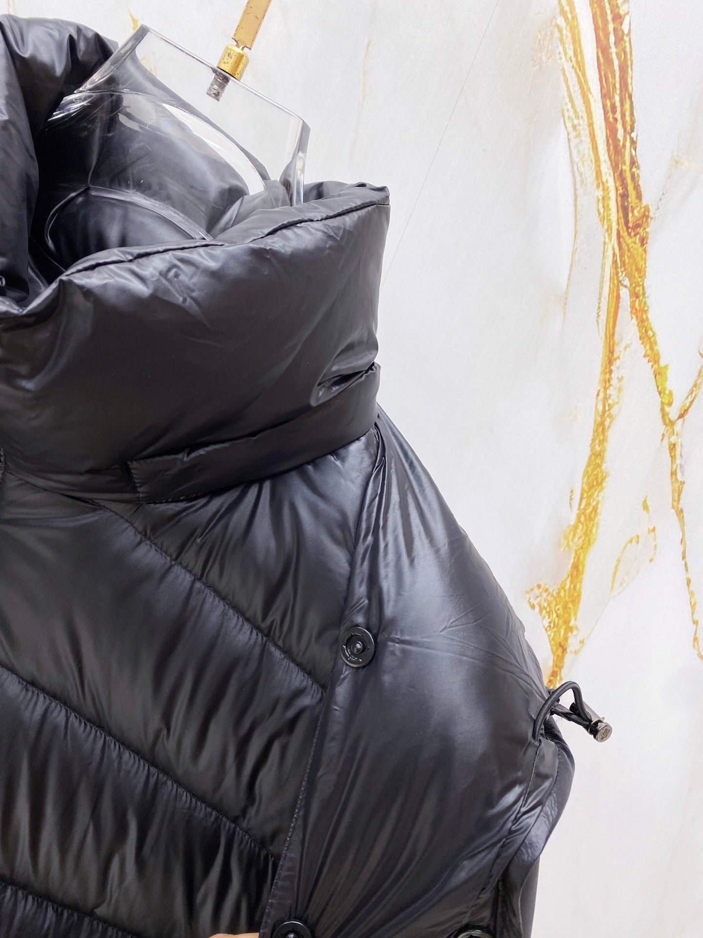 Long puffer jacket front with hood wrap and buttoned collar