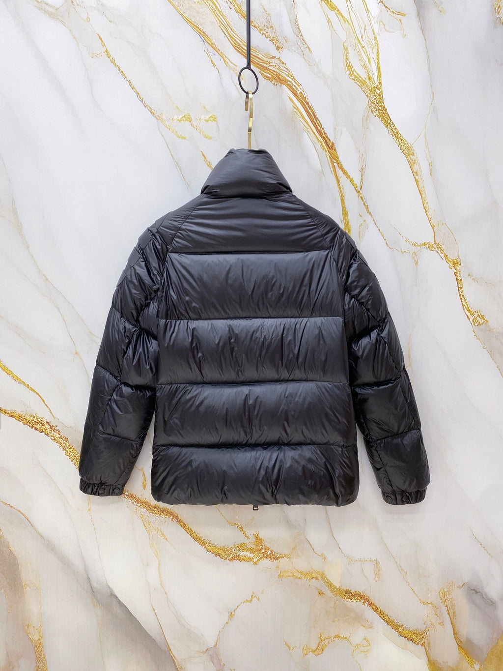 Moncler long puffer jacket back view, dark navy, quilted puffer design