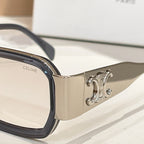 Celine sunglasses temple close-up with engraved metal logo and dark frame.