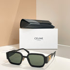 Celine square sunglasses with dark frames and green tinted lenses.