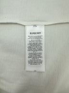Burberry inner care label on white T-shirt with size and fabric info