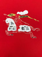 Red crew-neck T-shirt with large cat illustration and decorative text graphic