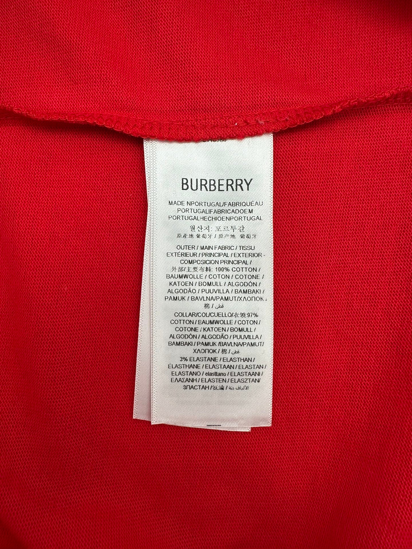 Red T-shirt with Burberry fabric label at neckline