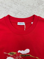 Red crew-neck T-shirt with embroidered-style cat graphic at chest
