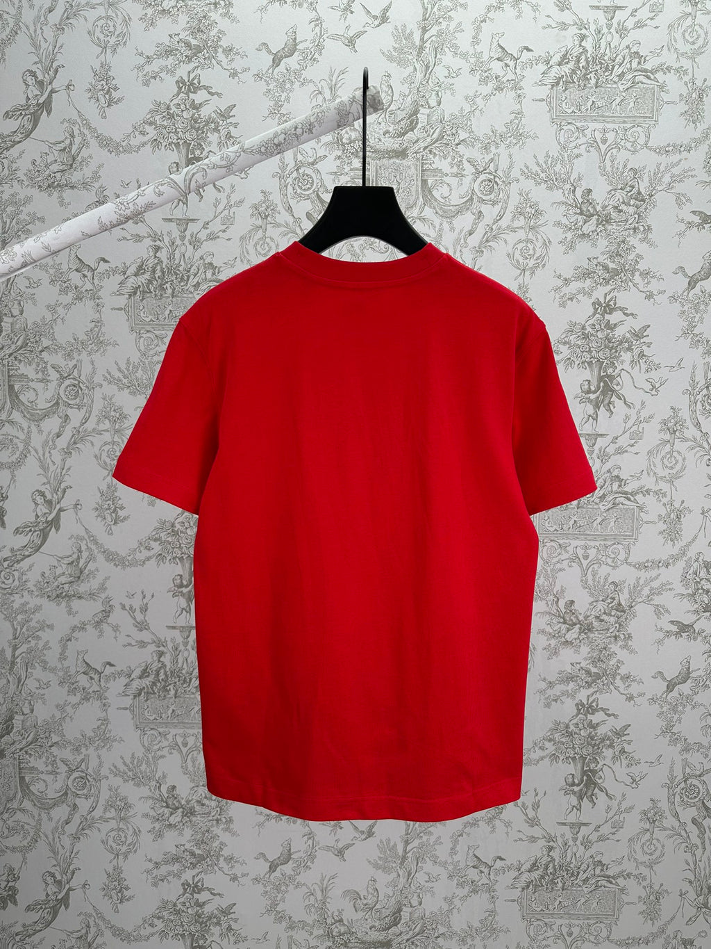 Red graphic T-shirt with crew neck and short sleeves, back view