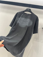Dark gray crew-neck short-sleeve T-shirt with chest logo print, angled view