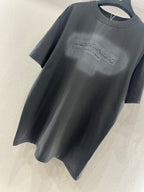 Dark gray crew-neck short-sleeve T-shirt with centered chest logo print