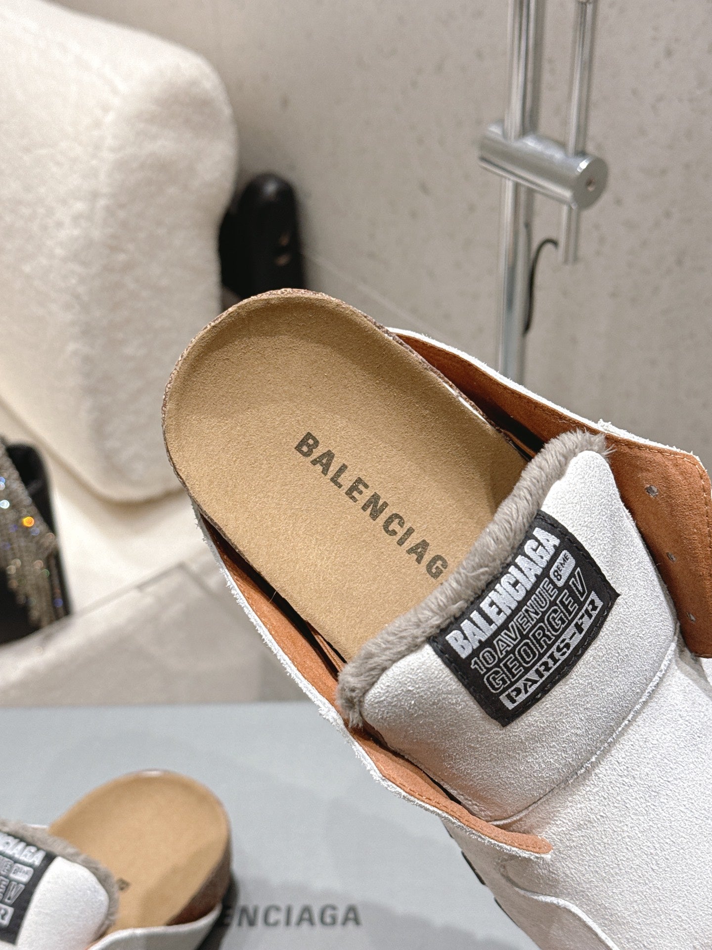 Balenciaga slide sandal with tan insole, white upper, logo label