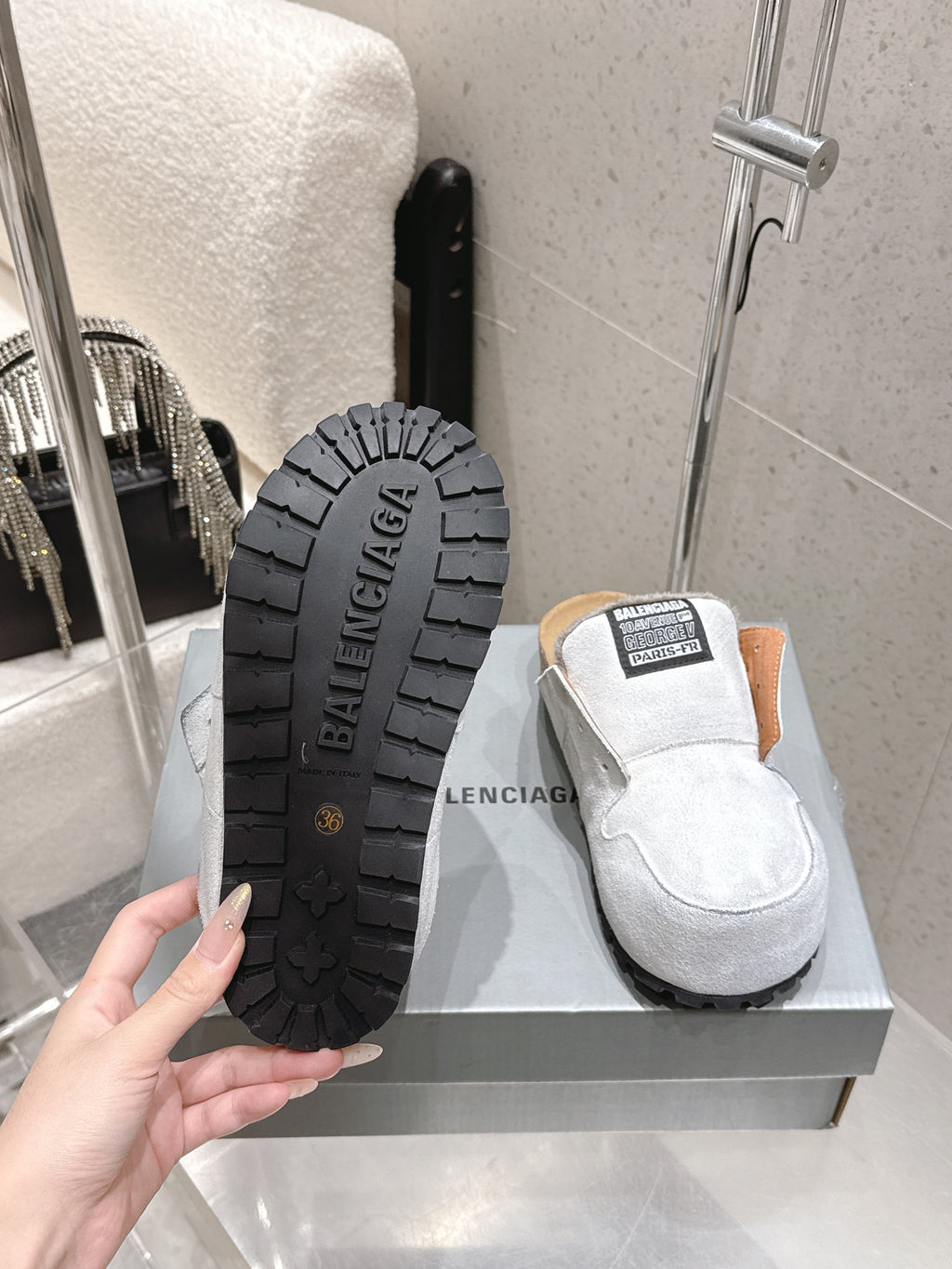 Balenciaga slide sandals, black outsole with BALENCIAGA text and tread detail