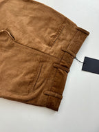 Tan corduroy pants with belt loops and front button