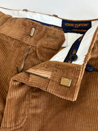 Louis Vuitton brown corduroy pants waistband and front details, including label tags