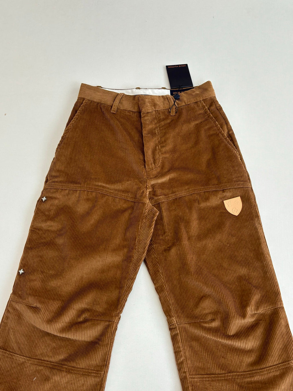 Louis Vuitton brown corduroy pants with star patches and back patch pocket