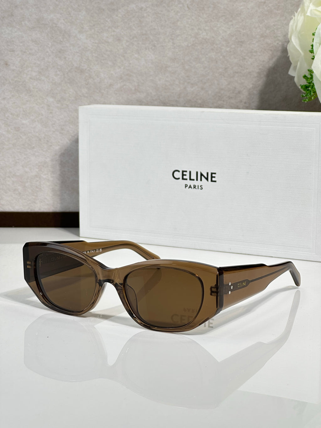 Celine sunglasses with brown tortoise frames and dark oval lenses