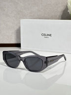 Celine sunglasses with dark gray frames and dark round lenses