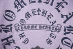 Lavender T-shirt fabric with dark decorative letter and symbol print