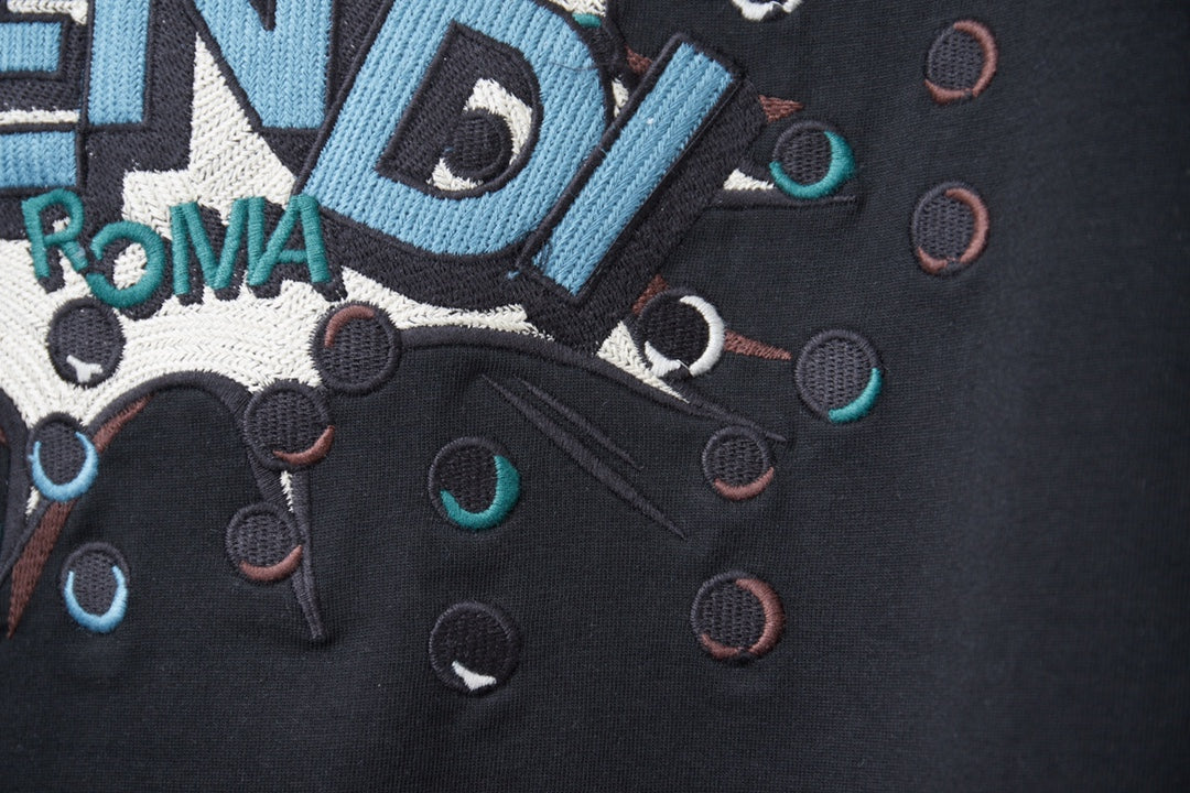 Fendi navy T-shirt close-up of lower graphic with confetti dots