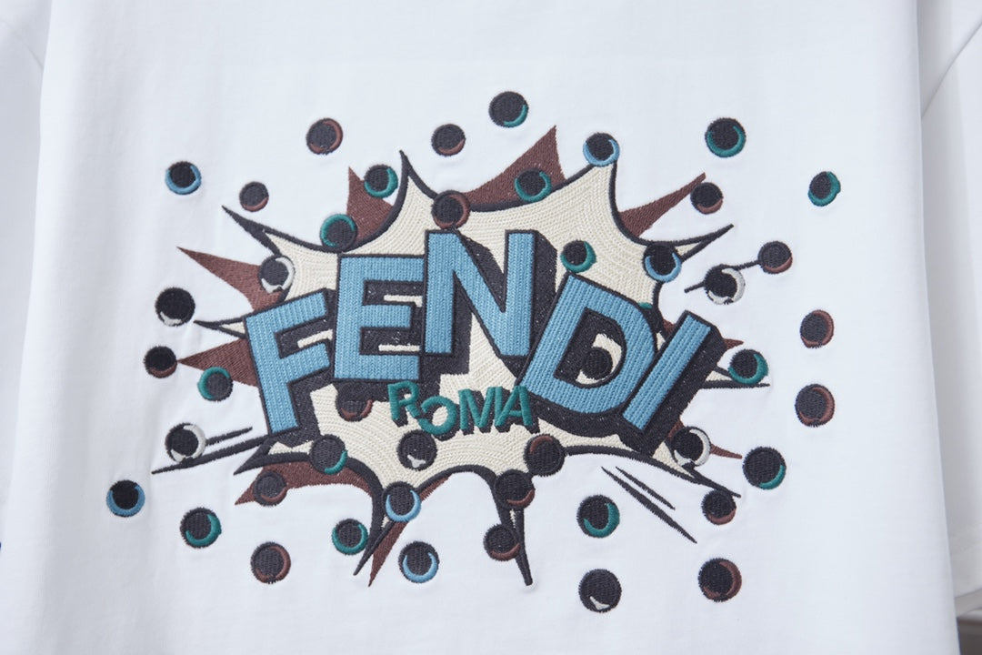 Fendi logo graphic on white T-shirt, blue FENDI text with splash accents