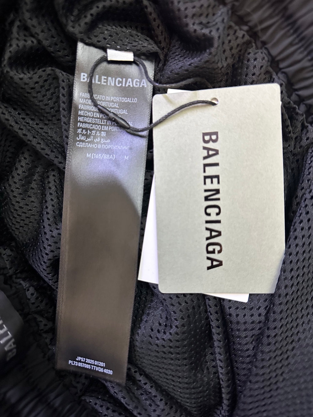 Balenciaga pants fabric with interior care label and BALENCIAGA tag