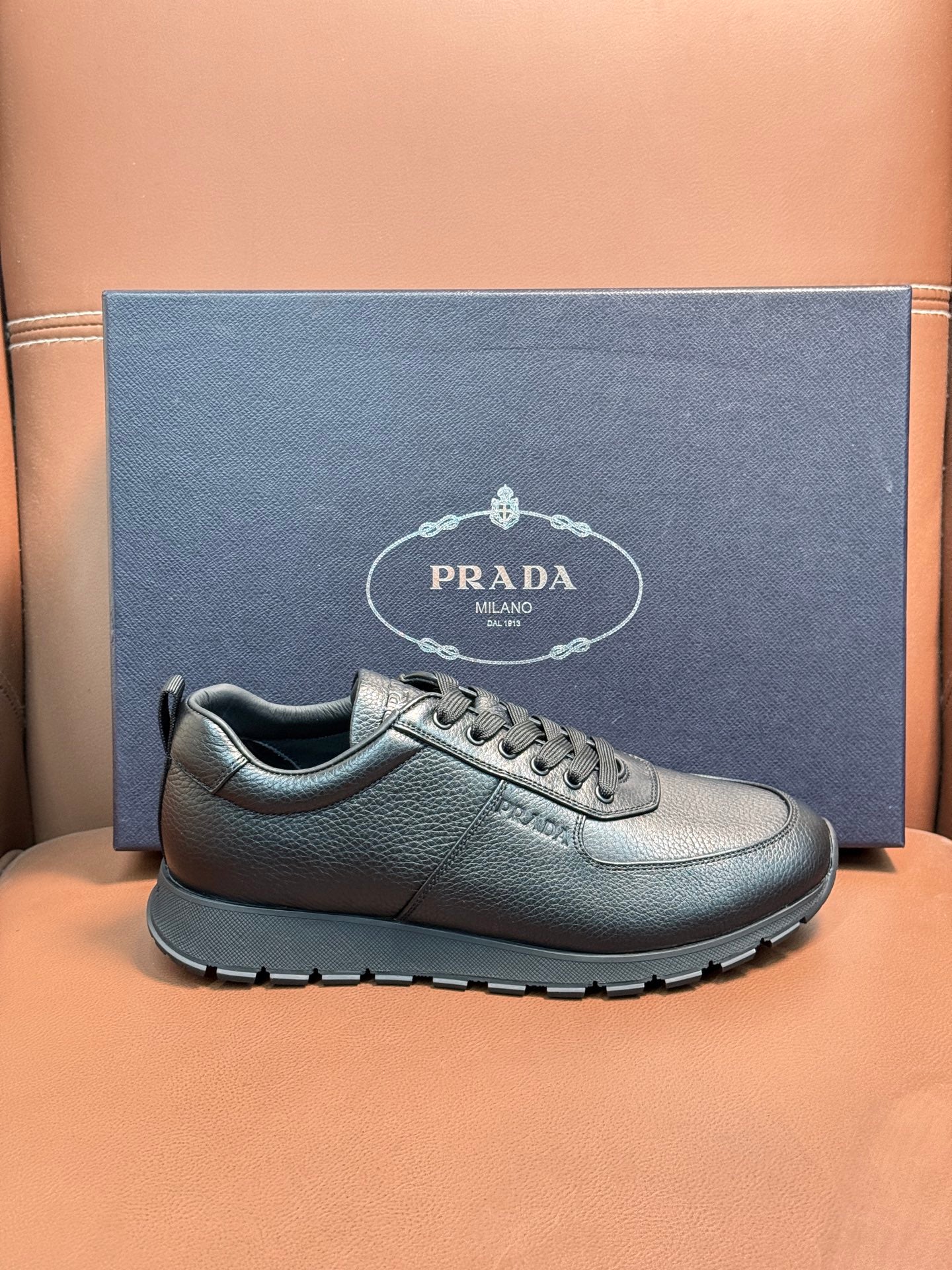 Silver leather lace-up sneaker with lace-up front and chunky tread outsole