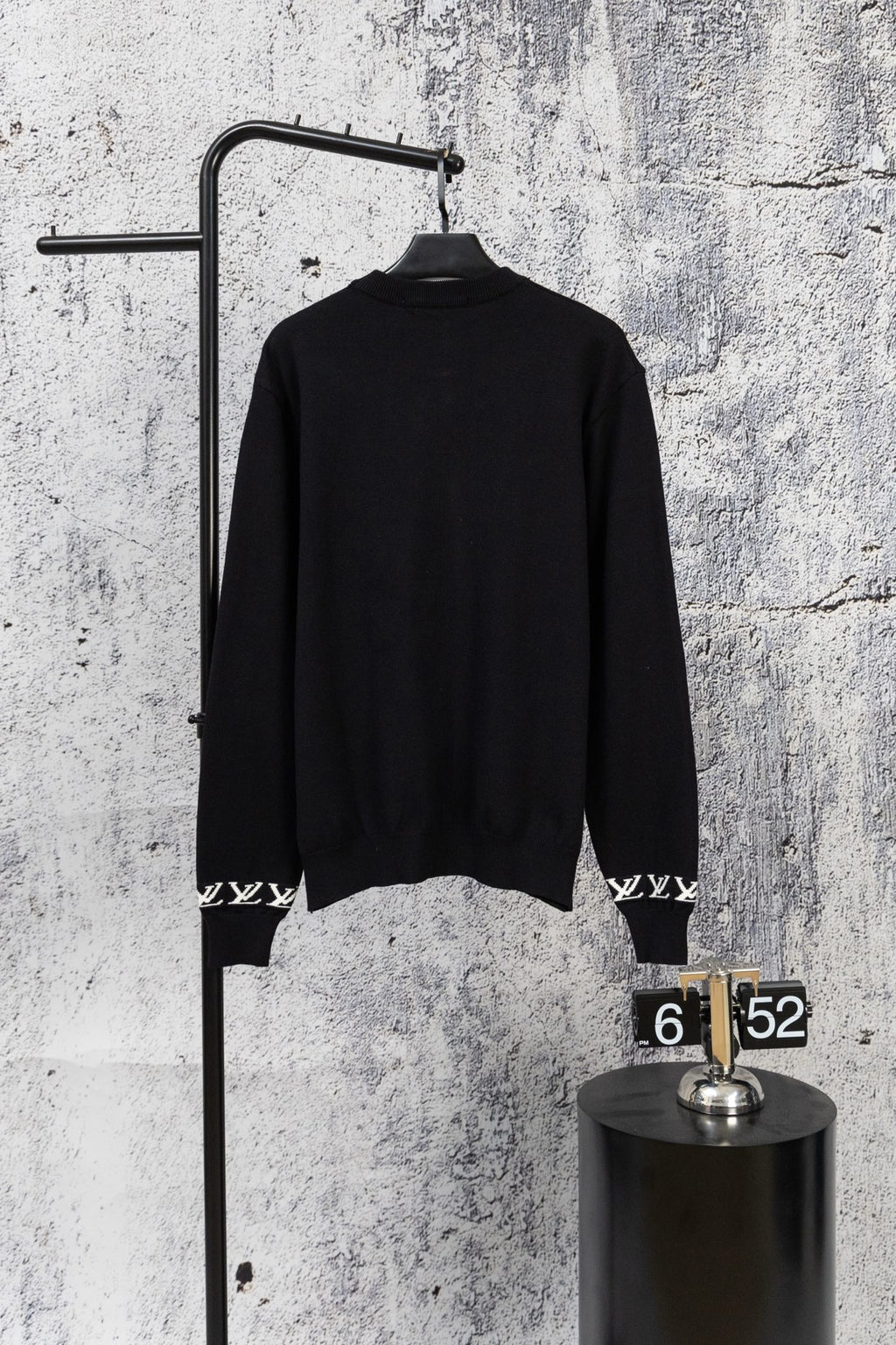 Black knit sweater, long sleeves, crew neck, plain back view