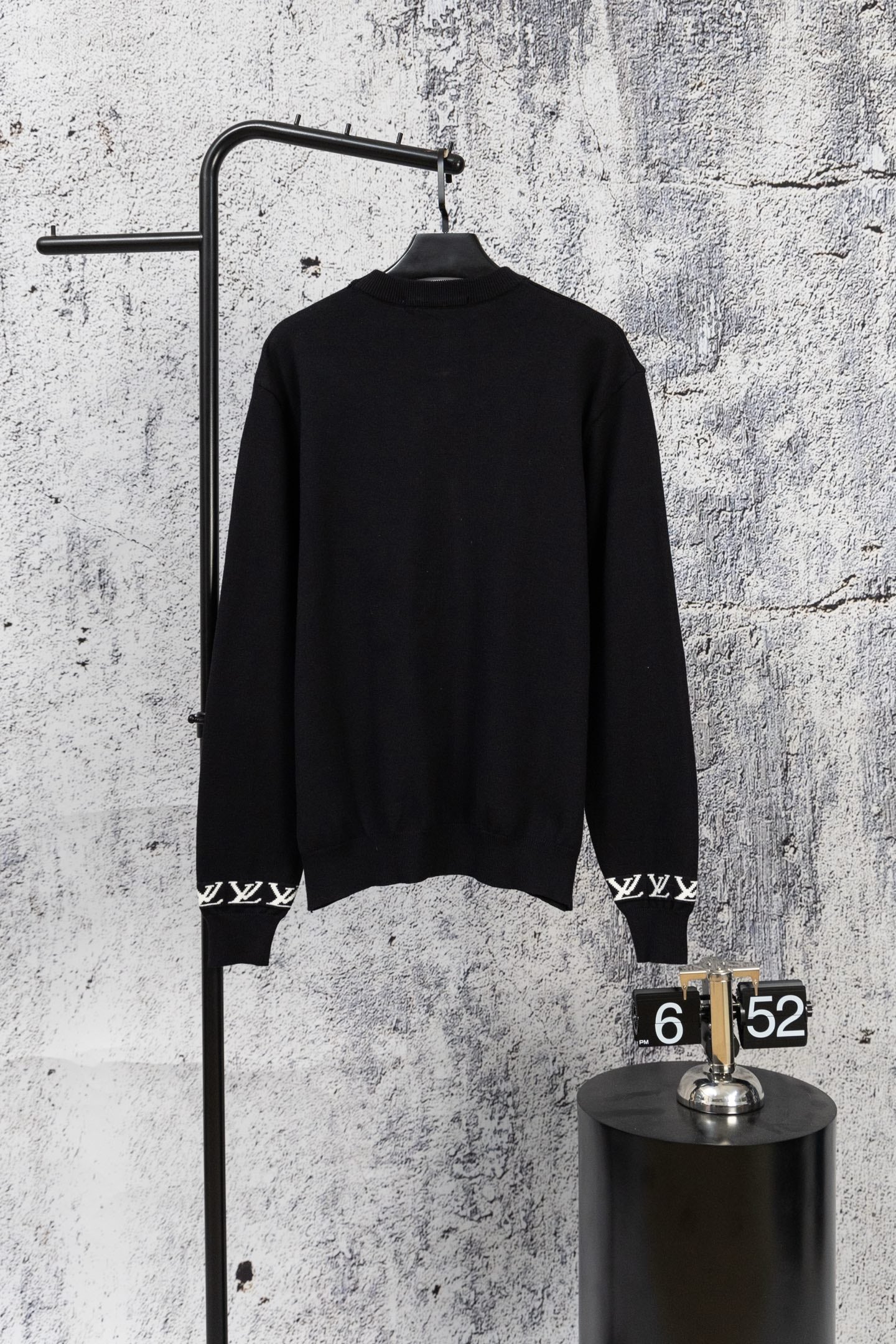 Black knit sweater, long sleeves, crew neck, plain back view