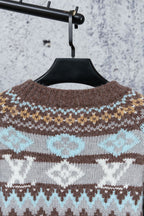Brown knit sweater yoke with blue and cream fair isle pattern