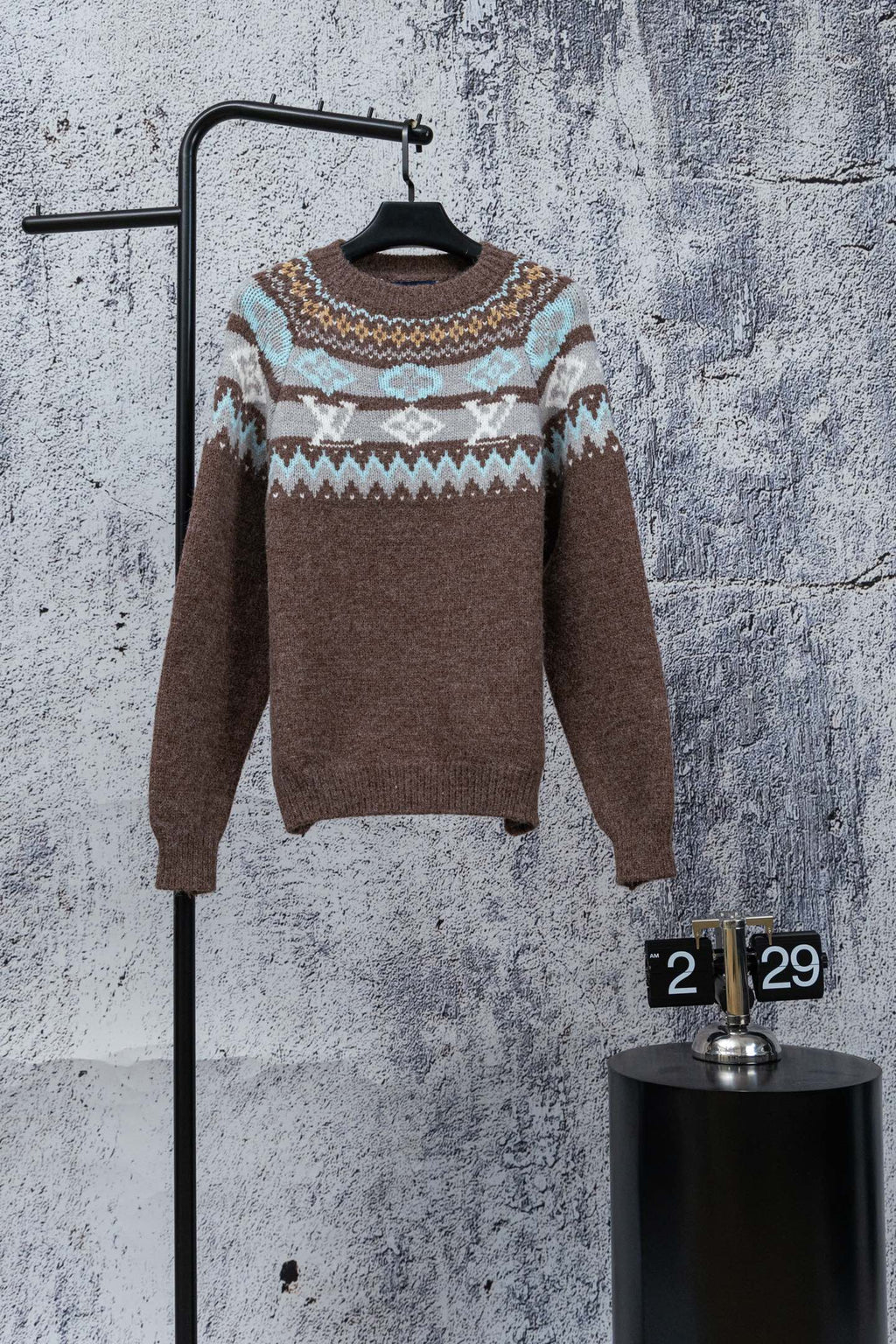 Brown knit sweater with Fair Isle yoke and long sleeves