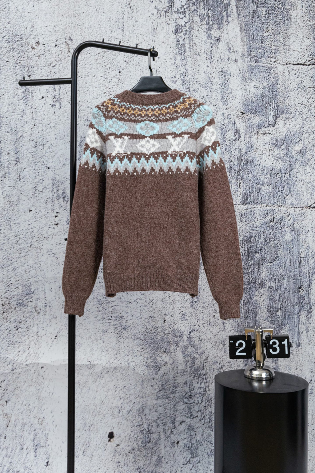 Brown knit sweater with patterned yoke and long sleeves