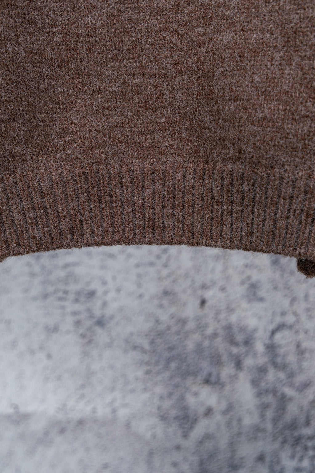 Brown ribbed knit hem band for a sweater