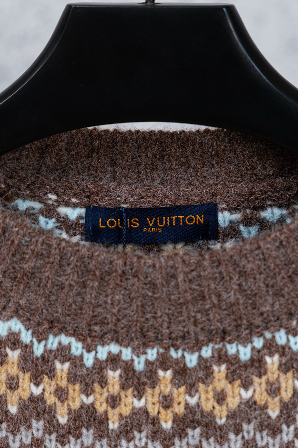 Brown knit sweater collar with Louis Vuitton Paris neck label