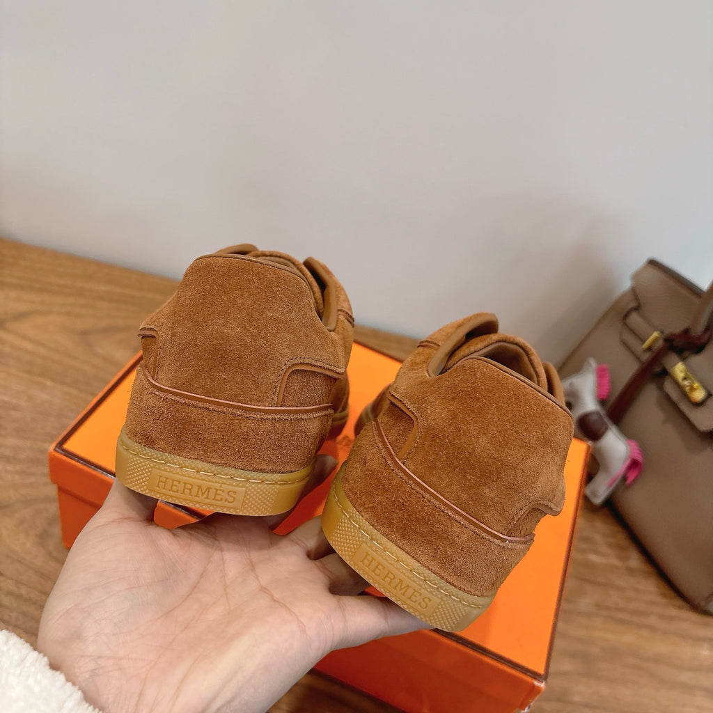 Hermes suede sneakers in tan with rear pull tab and stitched heel panel