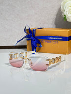 Louis Vuitton sunglasses, gold frame with pink tinted lenses and metal chain-link detail
