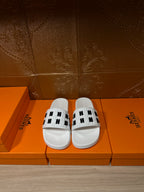 Hermes sandals, white slide with black H patterned strap