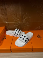 Hermes sandals, white slide with black H patterned upper