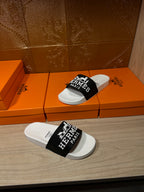 Hermes slide sandal pair, white footbeds with black logo band