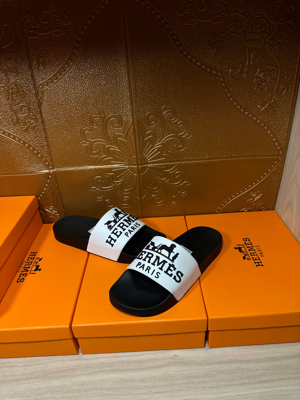 Hermes slide sandals, black footbeds with white logo strap and black outsole