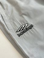 Light blue Balenciaga logo patch on the shorts leg with visible stitched seams