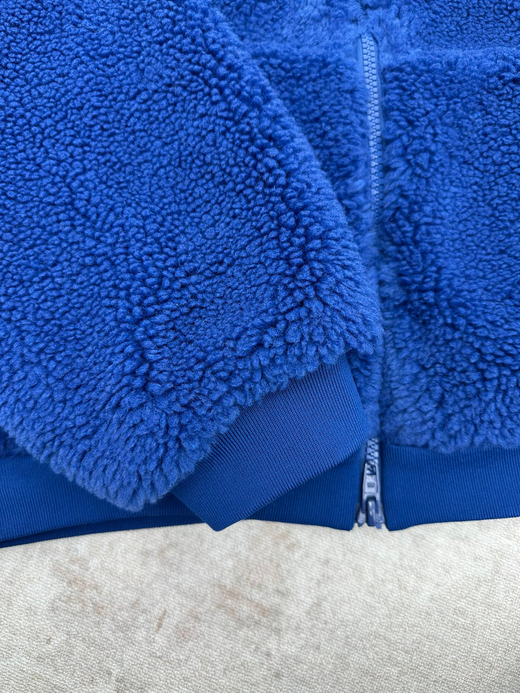 Balenciaga blue sherpa fleece jacket with front zipper and ribbed cuffs