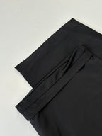 Black Balenciaga track pants detail, textured side stripe and stitched seam