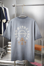 Light blue short-sleeve T-shirt back with circular cross and lettering print